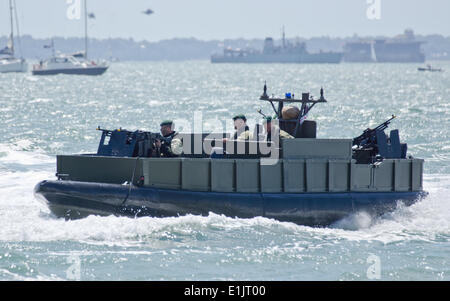 Portsmouth, Hampshire, UK. 05th June, 2014. The Royal Marines stage a modern day landing. Credit:  Scott Carruthers/Alamy Live News Stock Photo