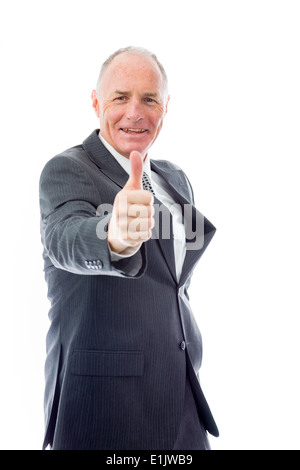 Businessman showing thumbs up gesture Stock Photo