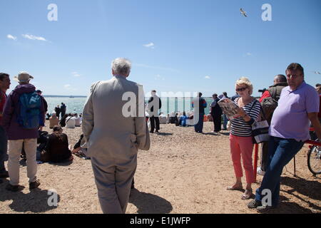 Southsea, Hampshire, UK. 5th June, 2014. Spectators gather on Southsea beach, England to watch the Red Arrows for the D-day commemorations. Credit:  Hanna Adcock/ZUMA Wire/ZUMAPRESS.com/Alamy Live News Stock Photo