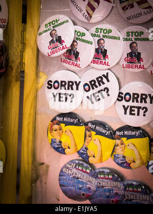 Ft, Worth, Texas, USA. 5th June 2014. At the trade show for the Texas Republican convention vendors offer a range of products from bumper stickers to buttons. Like these saying 'Sorry Yet' with the Democratic symbol in the letter O, 'Stop Global Warming, GAG a LIBERAL,' and 'Not Hillary' on a WWII poster. Credit:  J. G. Domke/Alamy Live News Stock Photo