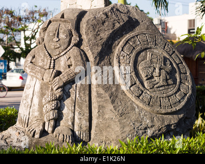 Mayan Style Sculpture at Tulum City Hall. Cast concrete sculptures with Mayan motifs decorate the square outside city hall. Stock Photo
