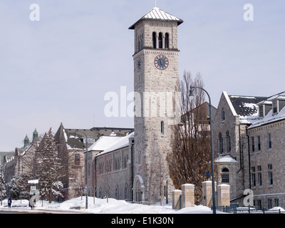 Grant Hall clock tower at Queen's Kingston. Typical limestone construction is demonstrated in the tower of Grant Hall on the cam Stock Photo