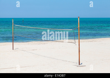 Net for beach volleyball on the sea coast Stock Photo