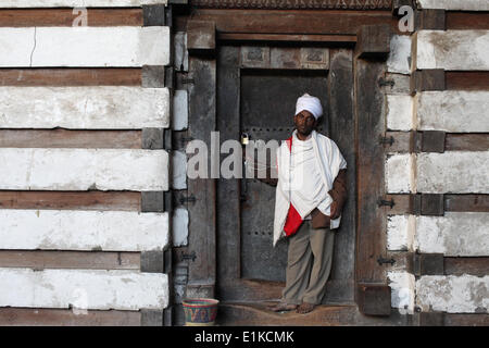 Priest at St. Yimrhane Kristos cave church Stock Photo