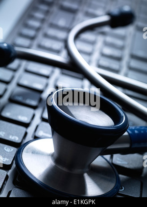 Closeup of stethoscope on keyboard Stock Photo - Alamy