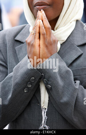 Praying woman Stock Photo