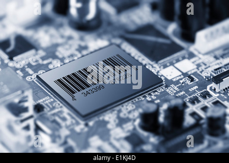 Electronic circuit chip on a printed circuit board. Stock Photo