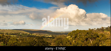 Amazing rainbow with huge clouds over Victor Harbour, on South Australia's Fleurieu Peninsula Stock Photo