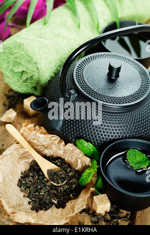 asian tea set and spa settings on wooden board Stock Photo