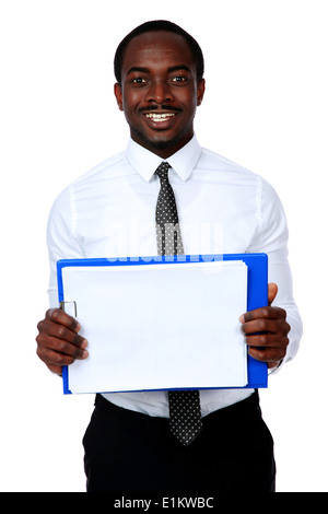 Happy african man holding folder and showing blank document Stock Photo