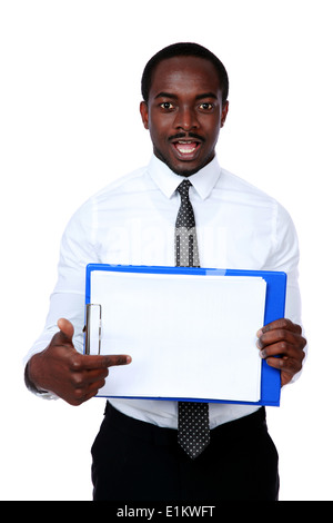 African man holding folder and showing on blank document Stock Photo