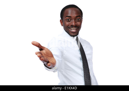 Happy african man takes out his hand over white background Stock Photo
