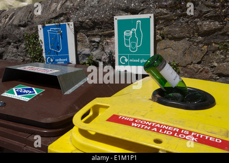 Coloured Recycling Bins in quayside in the cornish seaside village of Mevagissey Stock Photo