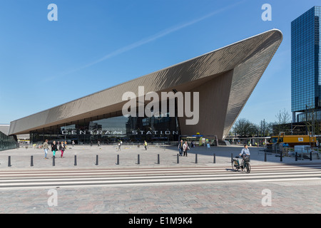 ROTTERDAM, THE NETHERLANDS - APRIL 16: Unknown travellers are entering and leaving the new in 2014 rebuild central station of Ro Stock Photo