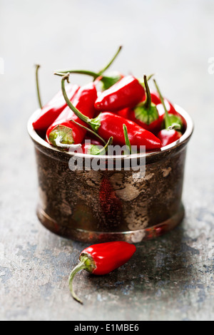 Red Hot Chili Peppers over wooden background
