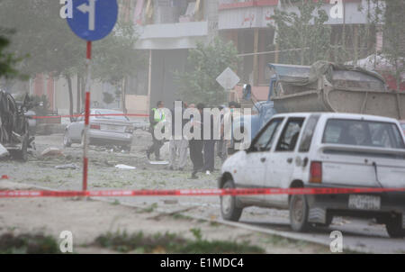 Kabul, Afghanistan. 6th June, 2014. People look at the explosion site ...