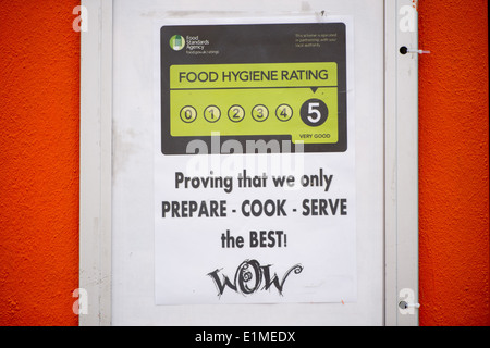 A Food Standards Agency Food Hygiene Rating poster displaying a 5 out of 5 'very good' rating. Stock Photo