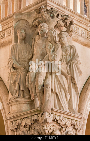 Venice - The sculpture from facade of Doge palace at night - The justice jjudgement of King Solomon Stock Photo