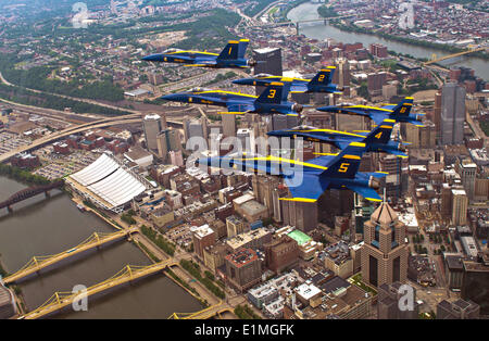 The US Navy Flight Demonstration Squadron, the Blue Angels, fly in the Delta Formation over downtown Pittsburgh near Point State Park, June 4, 2014 in Pittsburgh, PA. Stock Photo