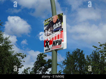 An election poster for the radical German rightwingers party NPD (German Nationaldemocratic Paty) showing the candidate for the European Parliament Udo Voigt is pictured In Berlin ahead of the European elections, May 16, 2014. Photo: Wolfram Steinberg dpa Stock Photo