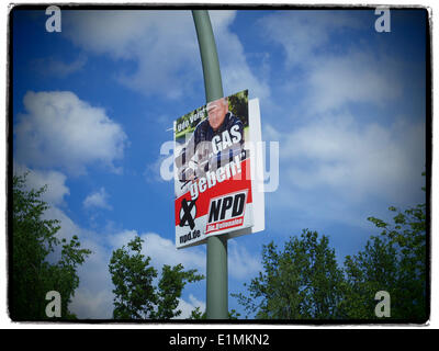 An election poster for the radical German rightwingers party NPD (German Nationaldemocratic Paty) showing the candidate for the European Parliament Udo Voigt is pictured In Berlin ahead of the European elections, May 16, 2014. Photo: Wolfram Steinberg dpa Stock Photo