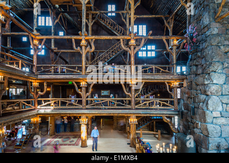 The interior of the historical Old Faithful Inn hotel lobby. Yellowstone National Park, Wyoming, USA. Stock Photo