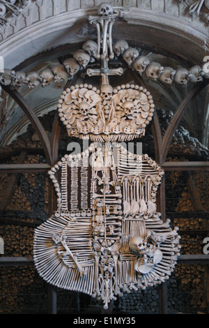 The Schwarzenberg coat of arms made of human bones and skulls in the Sedlec Ossuary in Kutna Hora, Czech Republic. Stock Photo