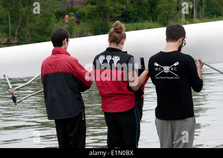 Oxford May Eights, Magdalen College boat being carried to the river, Oxford, UK Stock Photo