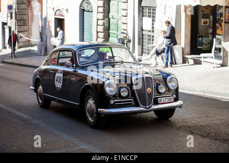 Mille miglia classic car road rally held over 1000 miles in Italy from Brescia to Rome and back. A 1956 Lancia Aurelia B20 Stock Photo