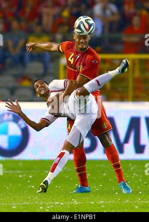 Brussels, Belgium. 7th June, 2014. Belgium's Vincent Kompany (top) vies during a friendly soccer match against Tunisia in Brussels, on June 7, 2014. Belgium won 1-0. Credit:  Gong Bing/Xinhua/Alamy Live News Stock Photo