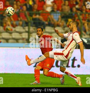 Brussels, Belgium. 7th June, 2014. Belgium's Nacer Chadli (L) vies during a friendly soccer match against Tunisia in Brussels, on June 7, 2014. Belgium won 1-0. Credit:  Gong Bing/Xinhua/Alamy Live News Stock Photo