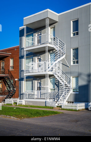 Three story apartment blocks on a street in Shawinigan, Quebec, Canada. Stock Photo