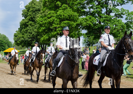 Ranger police riders show in city horse festival Stock Photo