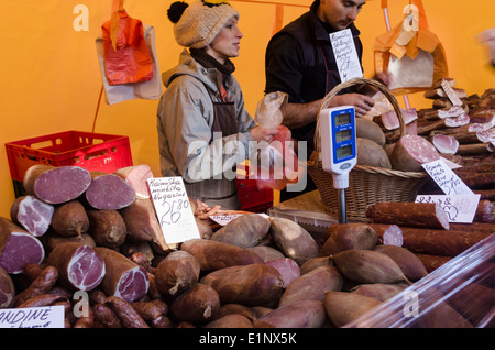 farmer sell smoked meat product bacon ham sausages Stock Photo