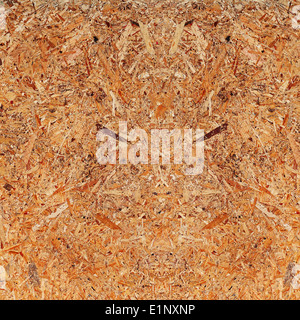 Recycled compressed wood chipboard. Useful for designers as background. Closeup. Stock Photo