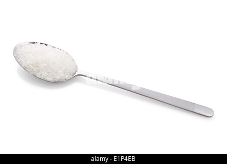 Salt or sugar on a teaspoon on white background, isolated Stock Photo