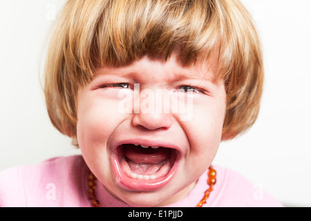 Close up portrait of baby crying Stock Photo
