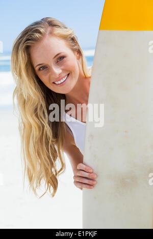 Young Sexy Caucasian Blonde Sitting Surfboard Beach Looking Camera Eye  Stock Photo by ©luckybusiness 393036352