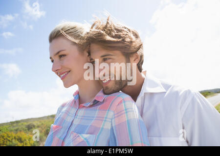 Smiling couple standing outside together Stock Photo