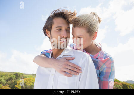 Smiling couple standing outside together Stock Photo