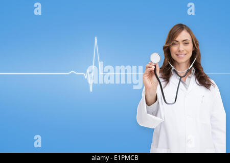 Composite image of happy doctor using stethoscope Stock Photo