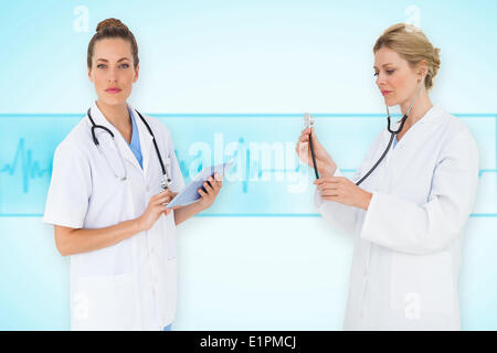 Composite image of female medical team Stock Photo