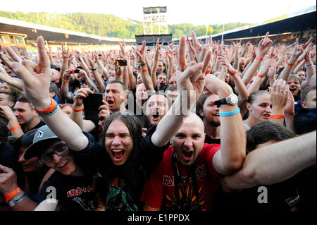 Brno, Czech Republic. 8th June, 2014. Fans of British heavymetal band Iron Maiden pictured during the concert in Brno, Czech Republic, June 8, 2014. The band visited Brno in the tour Maiden England. Credit:  Vaclav Salek/CTK Photo/Alamy Live News Stock Photo