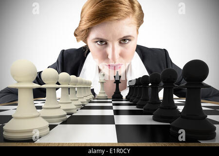 Composite image of focused businesswoman Stock Photo