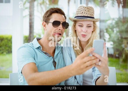 Hip young couple taking a selfie together Stock Photo