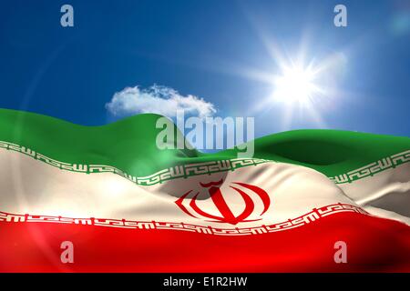 Iran national flag under sunny sky Stock Photo