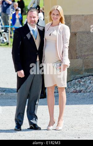 Stockholm, Sweden. 08th June, 2014. Gustaf Magnuson and Vicky Magnuson attend the christening of Swedish Princess Leonore at Drottningholm Palace outside Stockholm, Sweden, 08 June 2014. Credit:  dpa picture alliance/Alamy Live News Stock Photo