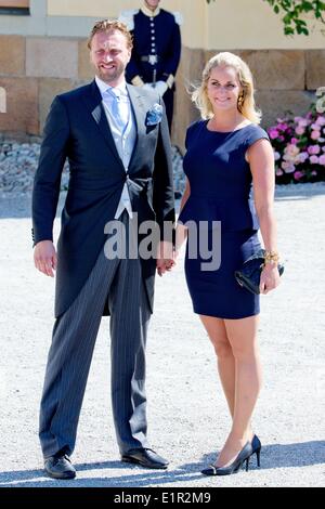 Stockholm, Sweden. 08th June, 2014. Lovisa de Geer and Niklas Bolle attend the christening of Swedish Princess Leonore at Drottningholm Palace outside Stockholm, Sweden, 08 June 2014. Credit:  dpa picture alliance/Alamy Live News Stock Photo