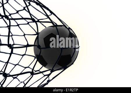 Football hitting the back of the net Stock Photo