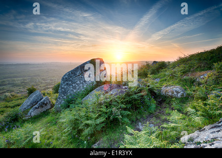 Sunset at Helman Tor a rocky area of rugged moor near Bodmin in Cornwall Stock Photo